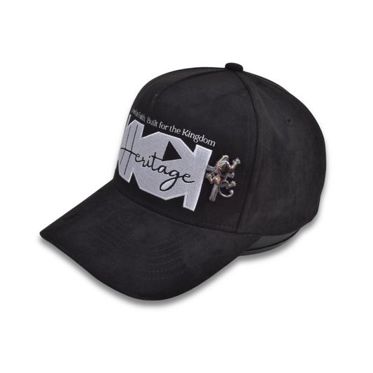Kingdom Heritage black suede hat with embroidered patch and lion-on-cross metal emblem – angled side view