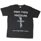 Front view: Black T-shirt with “Pray, Then Pressure” and smoke-cross design, faith-based streetwear by Cotton Faith.
